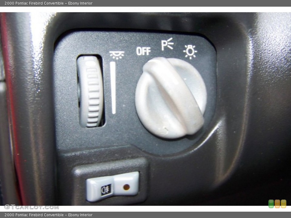 Ebony Interior Controls for the 2000 Pontiac Firebird Convertible #54015065