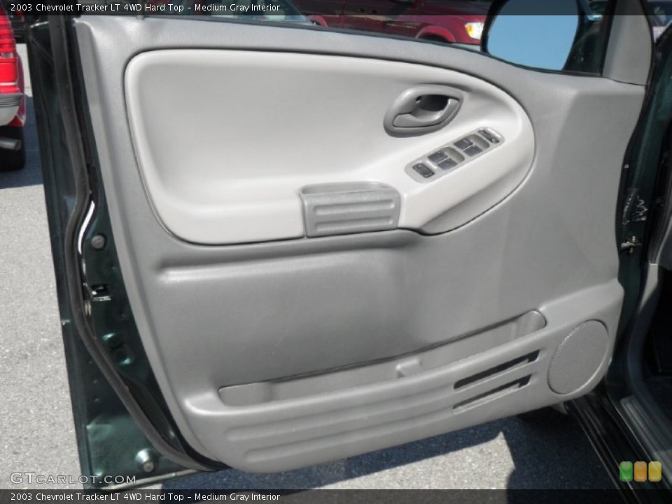 Medium Gray Interior Door Panel for the 2003 Chevrolet Tracker LT 4WD Hard Top #54020795
