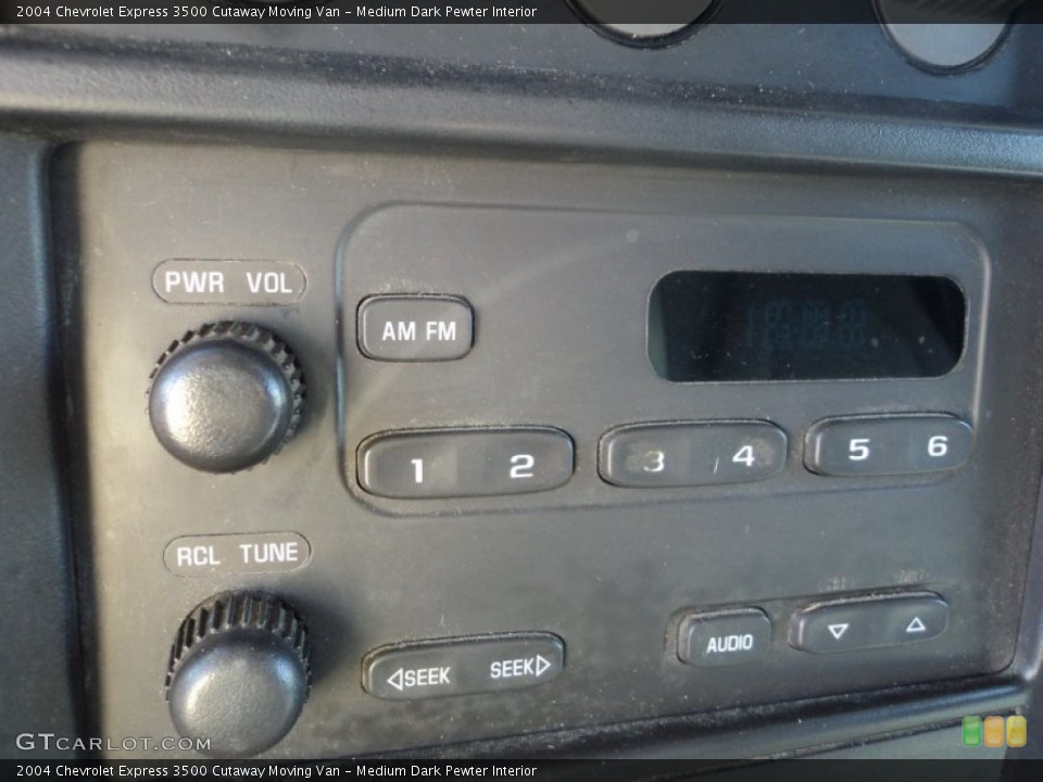 Medium Dark Pewter Interior Audio System for the 2004 Chevrolet Express 3500 Cutaway Moving Van #54039453