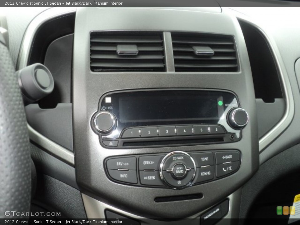 Jet Black/Dark Titanium Interior Controls for the 2012 Chevrolet Sonic LT Sedan #54058928