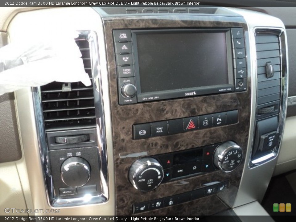 Light Pebble Beige/Bark Brown Interior Controls for the 2012 Dodge Ram 3500 HD Laramie Longhorn Crew Cab 4x4 Dually #54059217