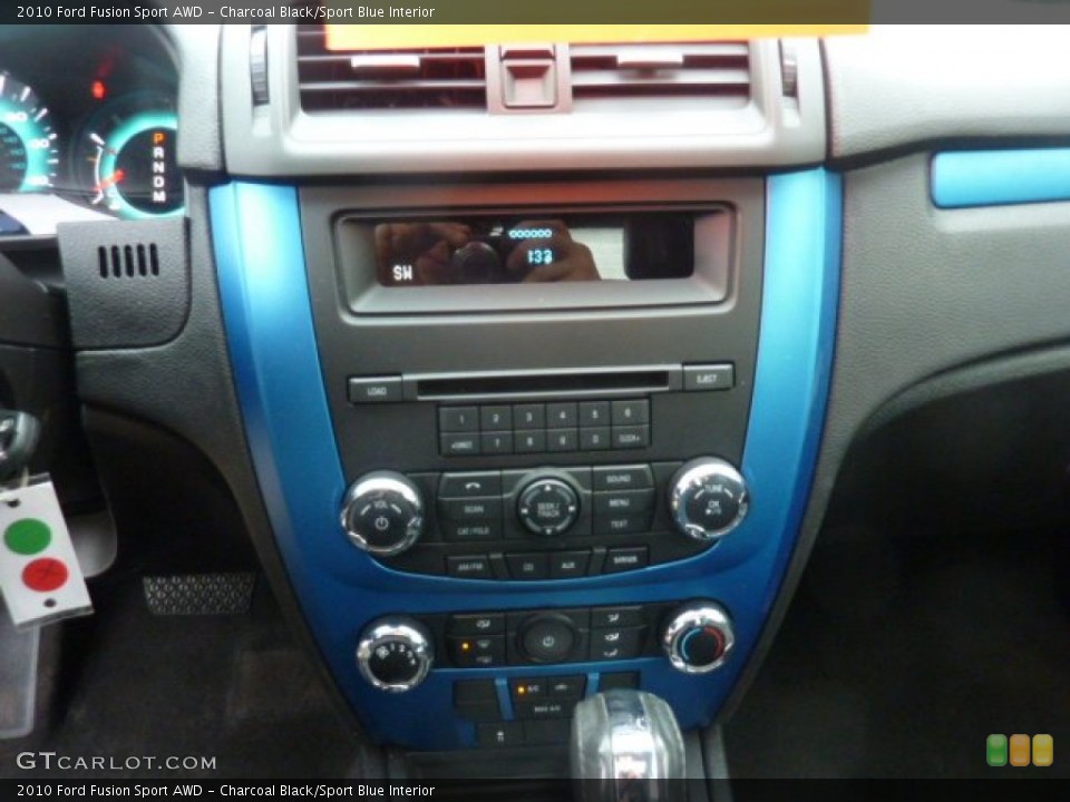 Charcoal Black/Sport Blue Interior Controls for the 2010 Ford Fusion Sport AWD #54078798