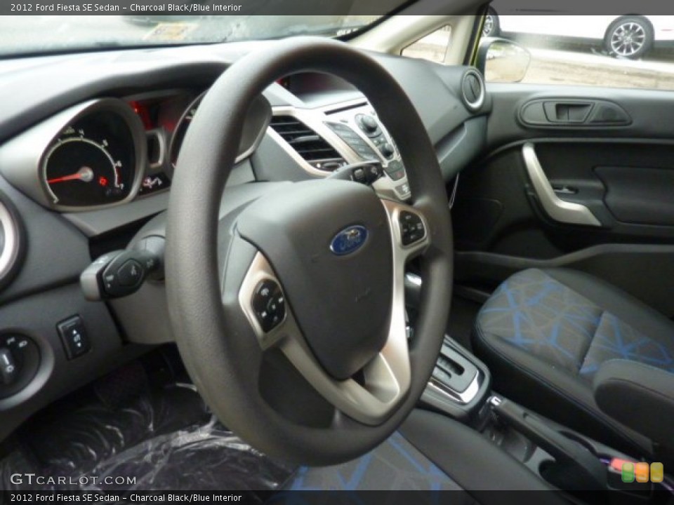 Charcoal Black/Blue Interior Steering Wheel for the 2012 Ford Fiesta SE Sedan #54081525