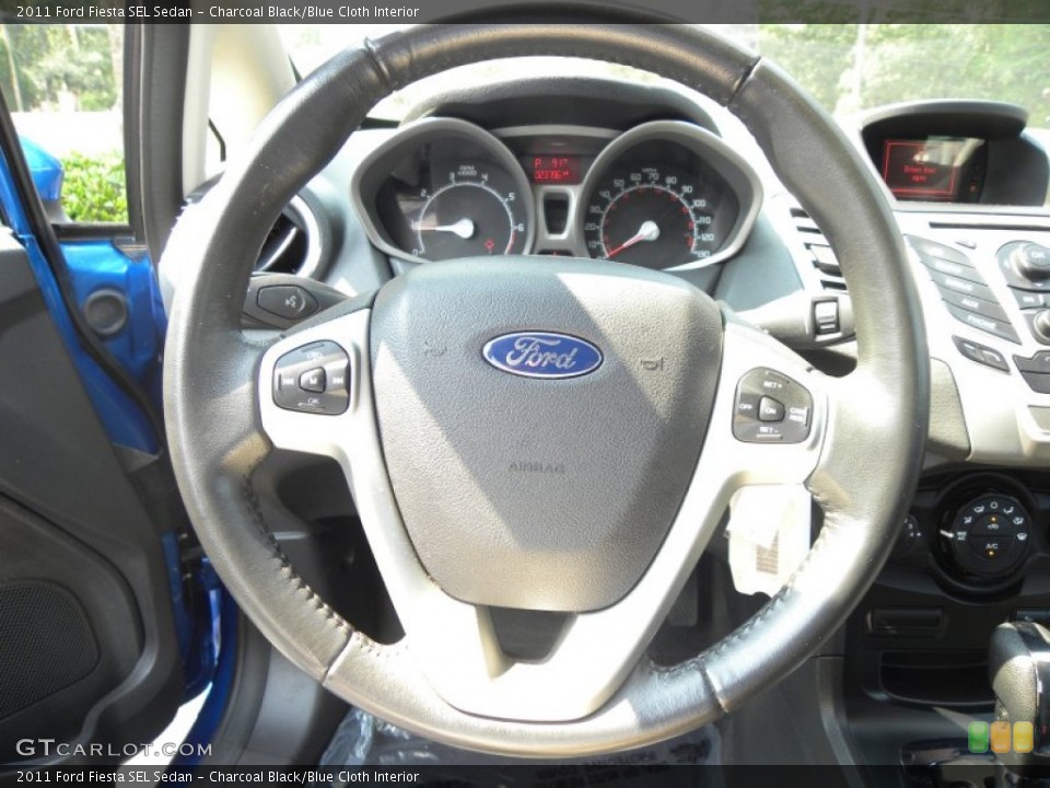 Charcoal Black/Blue Cloth Interior Steering Wheel for the 2011 Ford Fiesta SEL Sedan #54118209