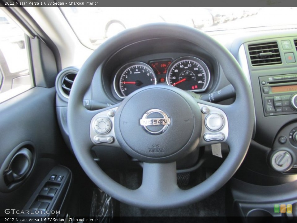 Charcoal Interior Steering Wheel for the 2012 Nissan Versa 1.6 SV Sedan #54122232