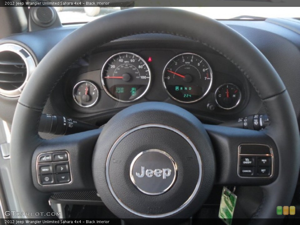 Black Interior Steering Wheel for the 2012 Jeep Wrangler Unlimited Sahara 4x4 #54164157