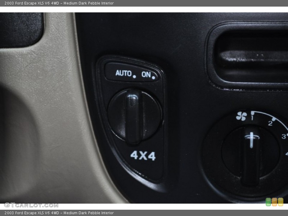 Medium Dark Pebble Interior Controls for the 2003 Ford Escape XLS V6 4WD #54167932