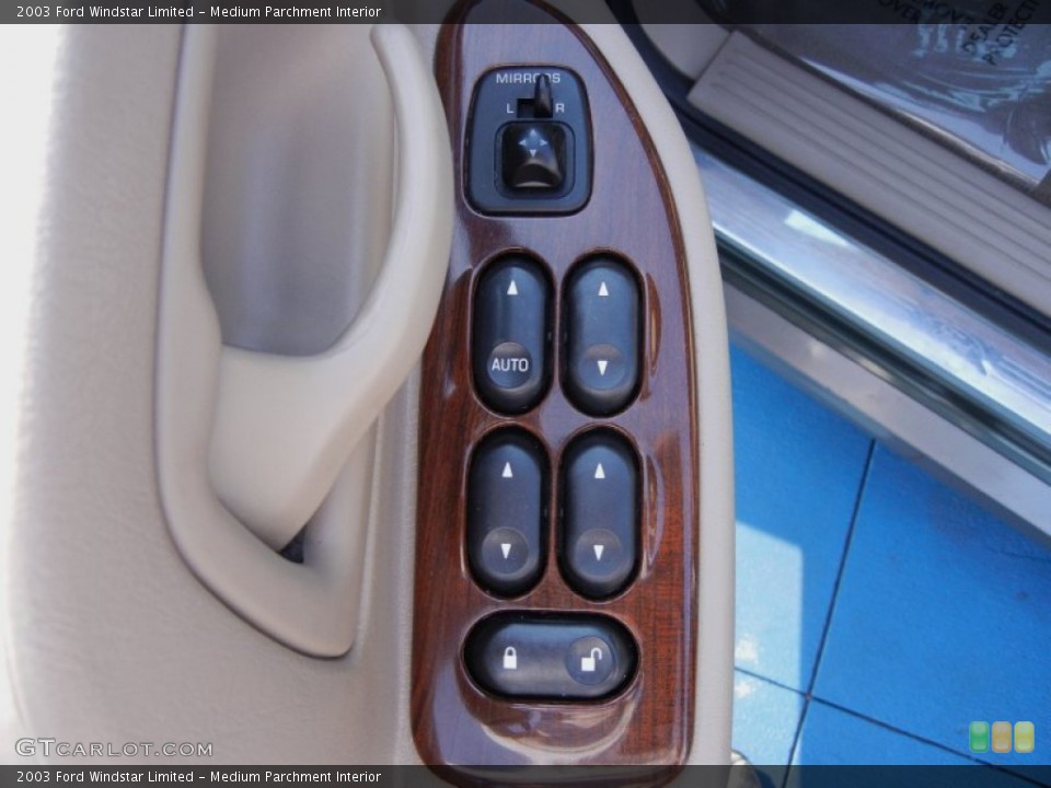 Medium Parchment Interior Controls for the 2003 Ford Windstar Limited #54169975