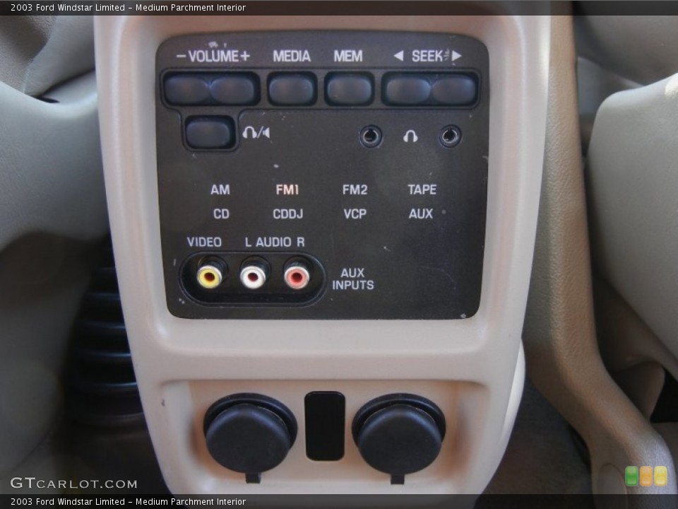 Medium Parchment Interior Controls for the 2003 Ford Windstar Limited #54170017