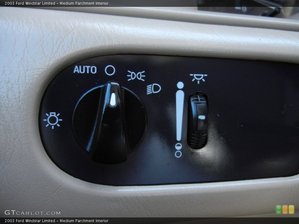 Medium Parchment Interior Controls for the 2003 Ford Windstar Limited #54170131