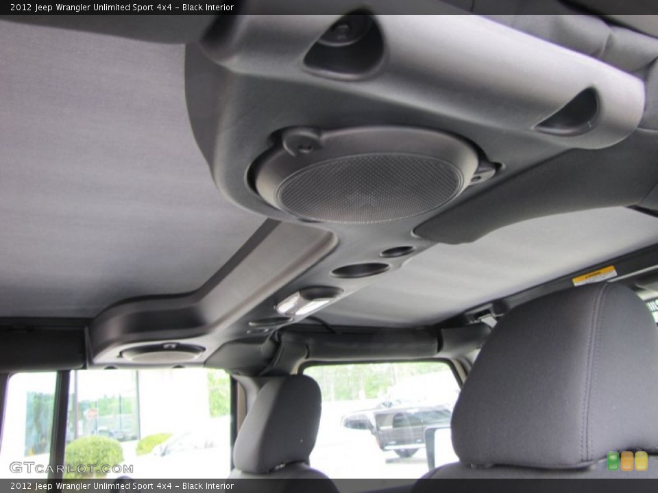 Black Interior Audio System for the 2012 Jeep Wrangler Unlimited Sport 4x4 #54216609