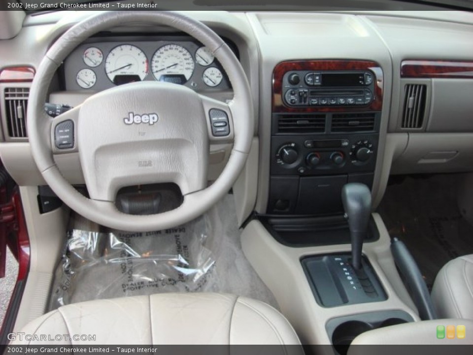 Taupe Interior Dashboard for the 2002 Jeep Grand Cherokee Limited #54224763