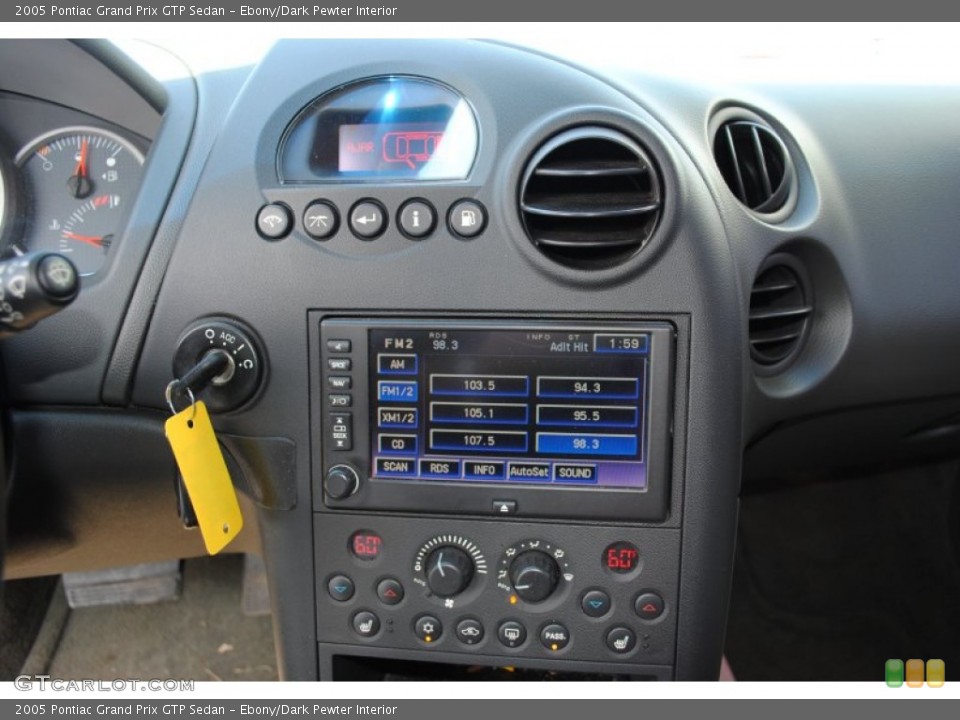 Ebony/Dark Pewter Interior Controls for the 2005 Pontiac Grand Prix GTP Sedan #54232647