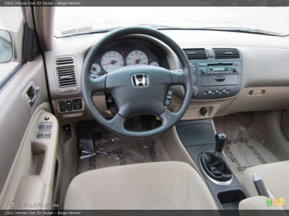 Beige Interior Dashboard for the 2002 Honda Civic EX Sedan #54250973