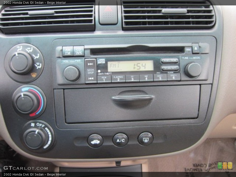 Beige Interior Audio System for the 2002 Honda Civic EX Sedan #54251009