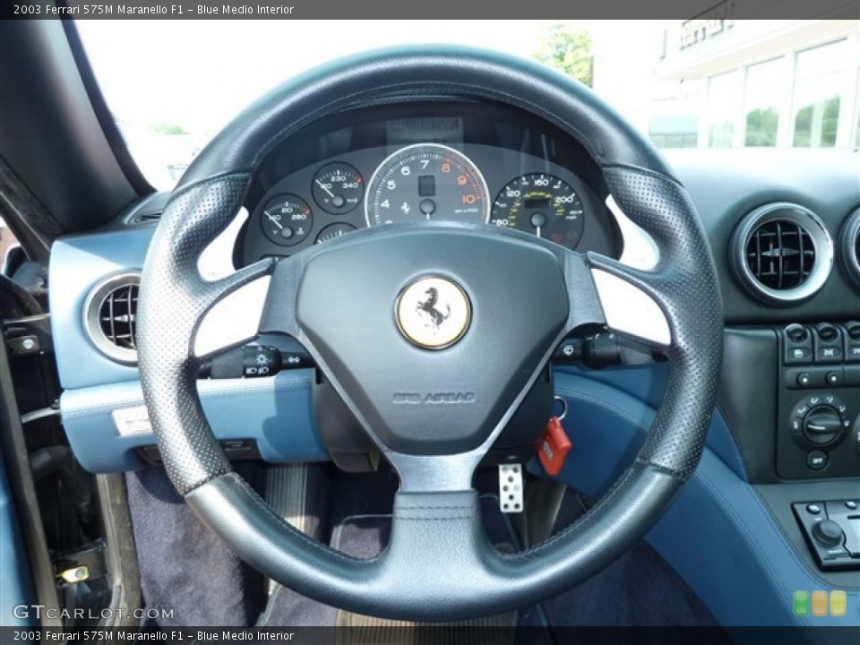 Blue Medio Interior Steering Wheel for the 2003 Ferrari 575M Maranello F1 #54255401