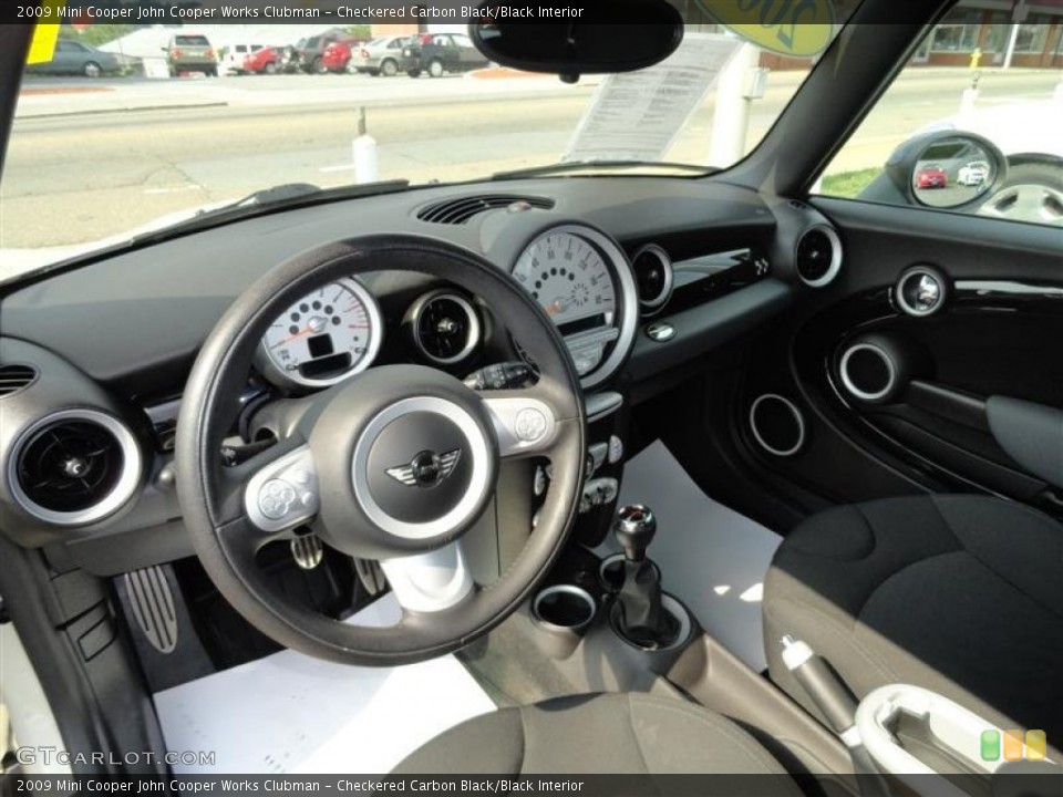 Checkered Carbon Black/Black Interior Dashboard for the 2009 Mini Cooper John Cooper Works Clubman #54296439