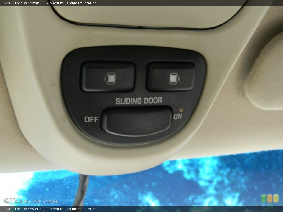 Medium Parchment Interior Controls for the 2003 Ford Windstar SEL #54350263