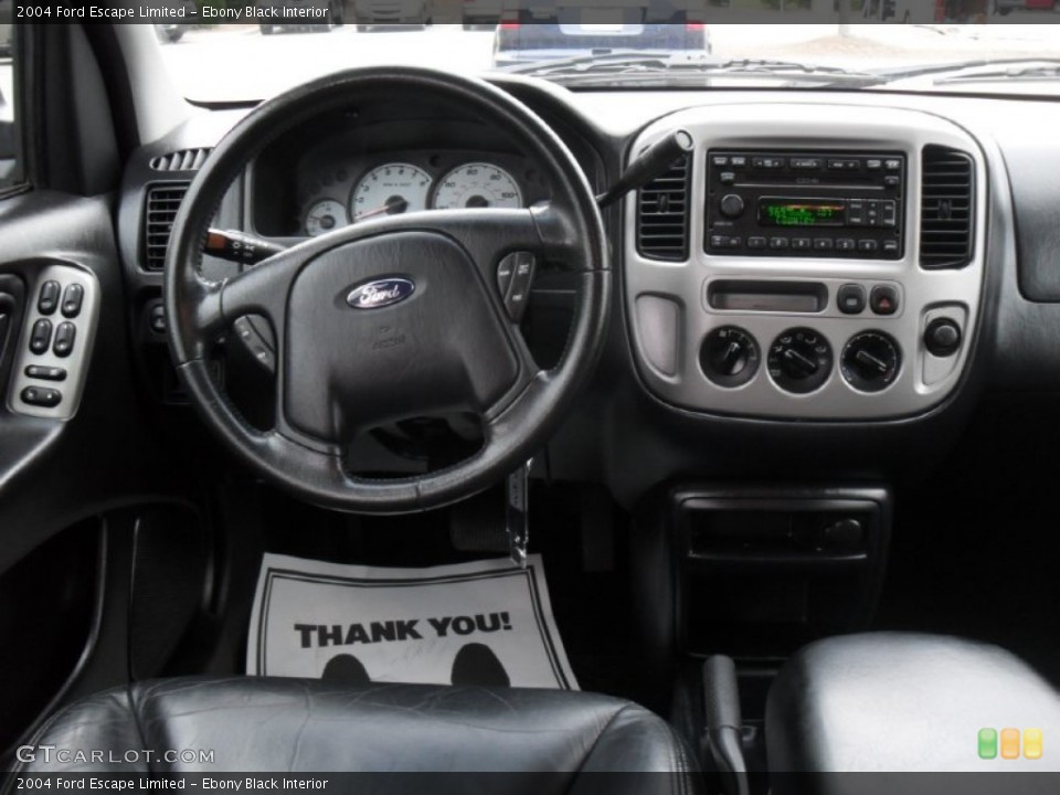 Ebony Black Interior Dashboard for the 2004 Ford Escape Limited #54356404