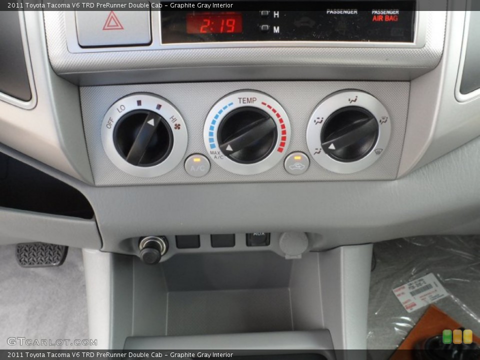 Graphite Gray Interior Controls for the 2011 Toyota Tacoma V6 TRD PreRunner Double Cab #54375862