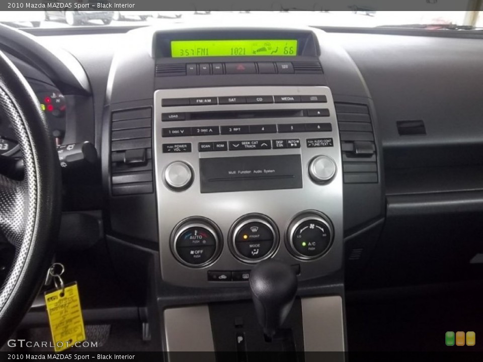 Black Interior Controls for the 2010 Mazda MAZDA5 Sport #54387193