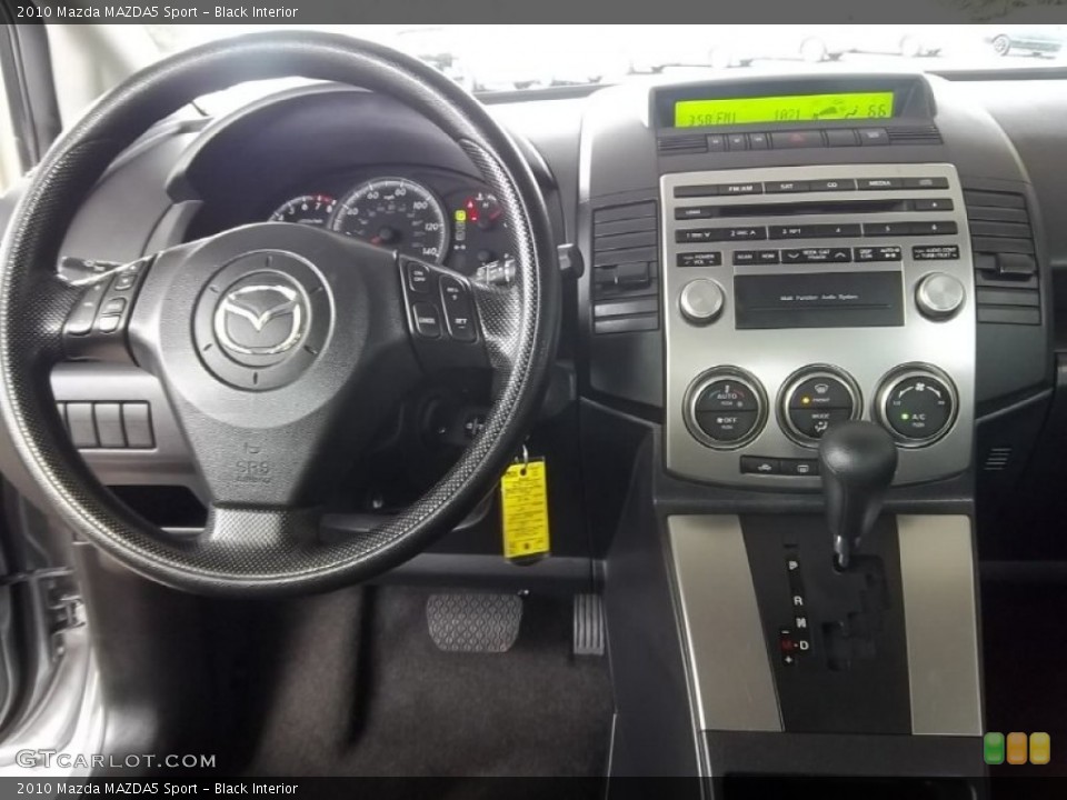 Black Interior Dashboard for the 2010 Mazda MAZDA5 Sport #54387213