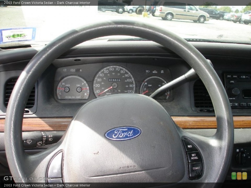 Dark Charcoal Interior Steering Wheel for the 2003 Ford Crown Victoria Sedan #54397292