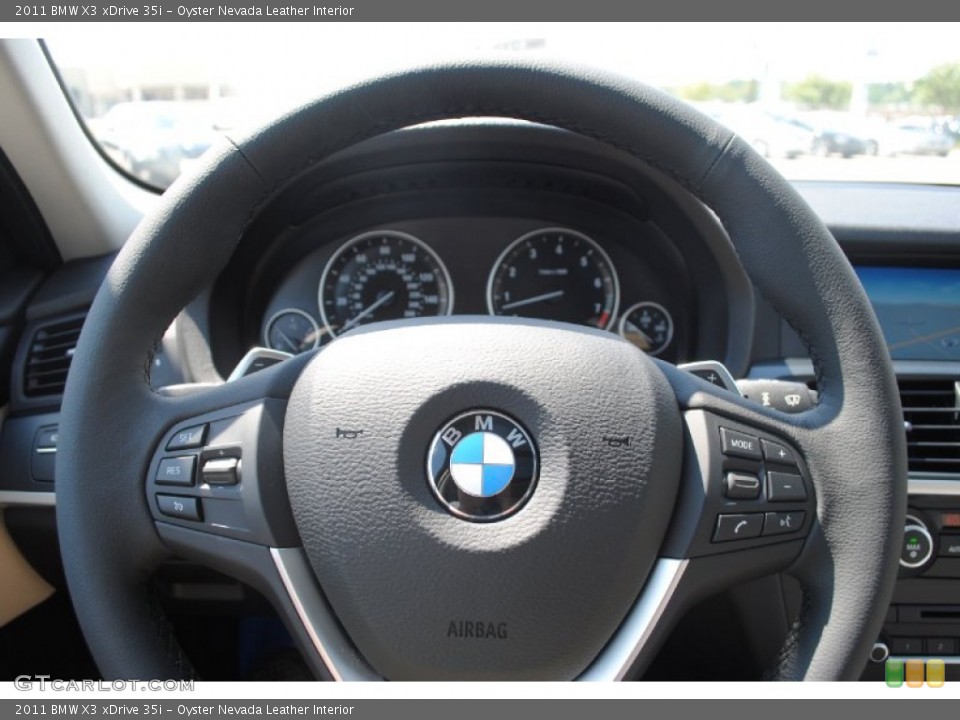 Oyster Nevada Leather Interior Steering Wheel for the 2011 BMW X3 xDrive 35i #54414421