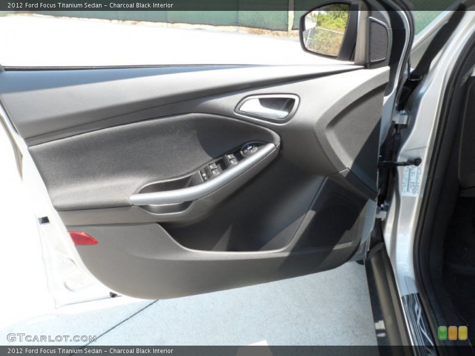 Charcoal Black Interior Door Panel for the 2012 Ford Focus Titanium Sedan #54423246