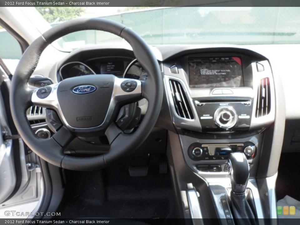 Charcoal Black Interior Dashboard for the 2012 Ford Focus Titanium Sedan #54423282