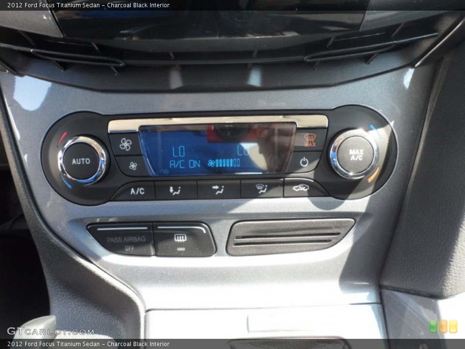 Charcoal Black Interior Controls for the 2012 Ford Focus Titanium Sedan #54423309