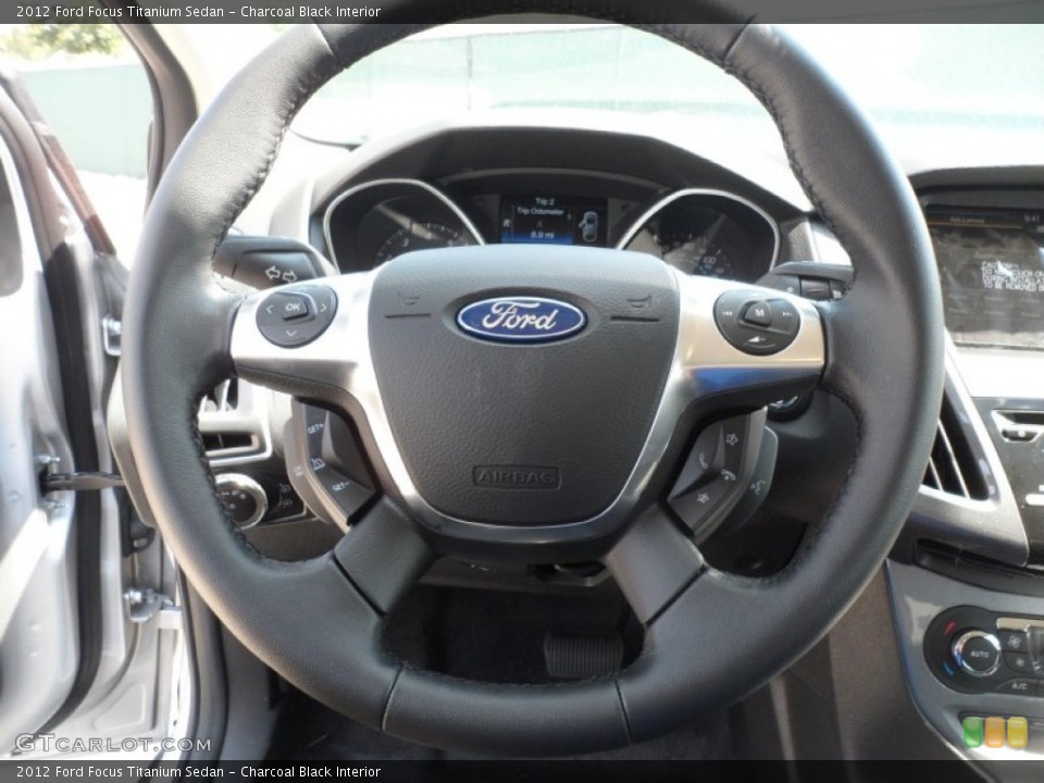 Charcoal Black Interior Steering Wheel for the 2012 Ford Focus Titanium Sedan #54423345