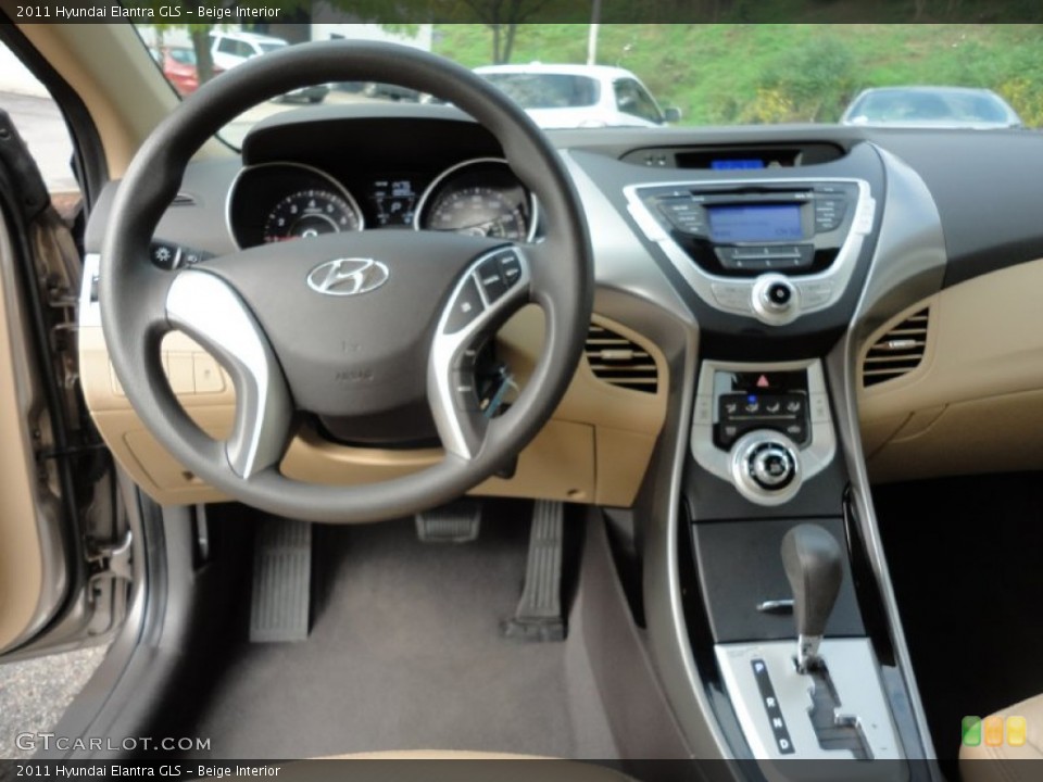 Beige Interior Dashboard for the 2011 Hyundai Elantra GLS #54438489