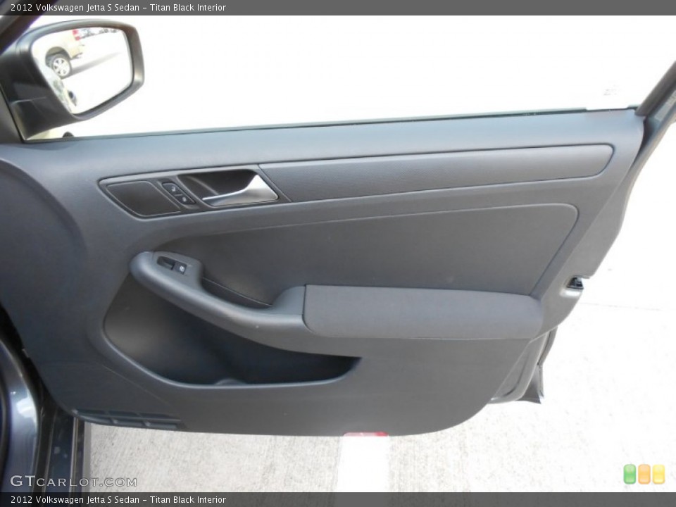 Titan Black Interior Door Panel for the 2012 Volkswagen Jetta S Sedan #54445656