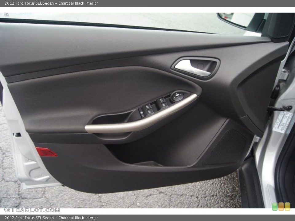 Charcoal Black Interior Door Panel for the 2012 Ford Focus SEL Sedan #54448758