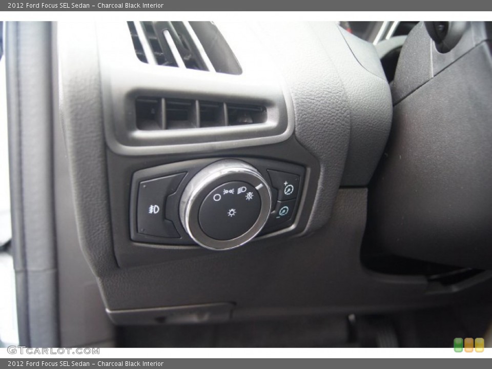 Charcoal Black Interior Controls for the 2012 Ford Focus SEL Sedan #54448790