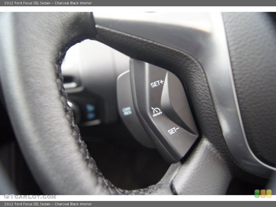 Charcoal Black Interior Controls for the 2012 Ford Focus SEL Sedan #54448833