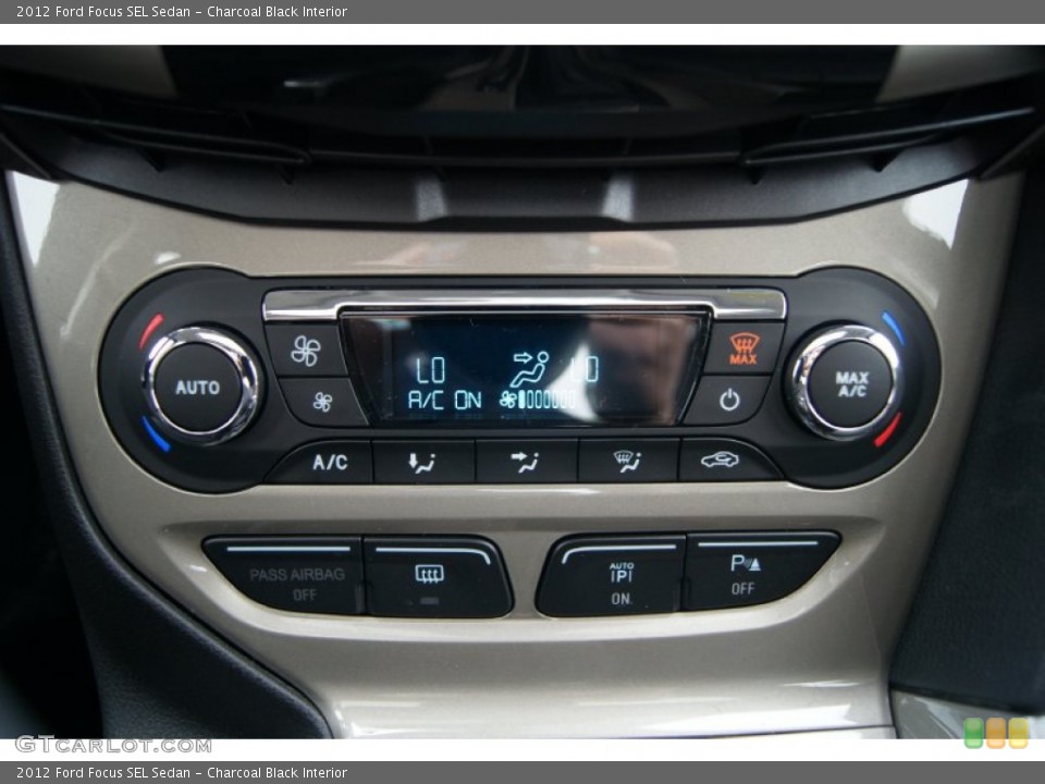Charcoal Black Interior Controls for the 2012 Ford Focus SEL Sedan #54448887