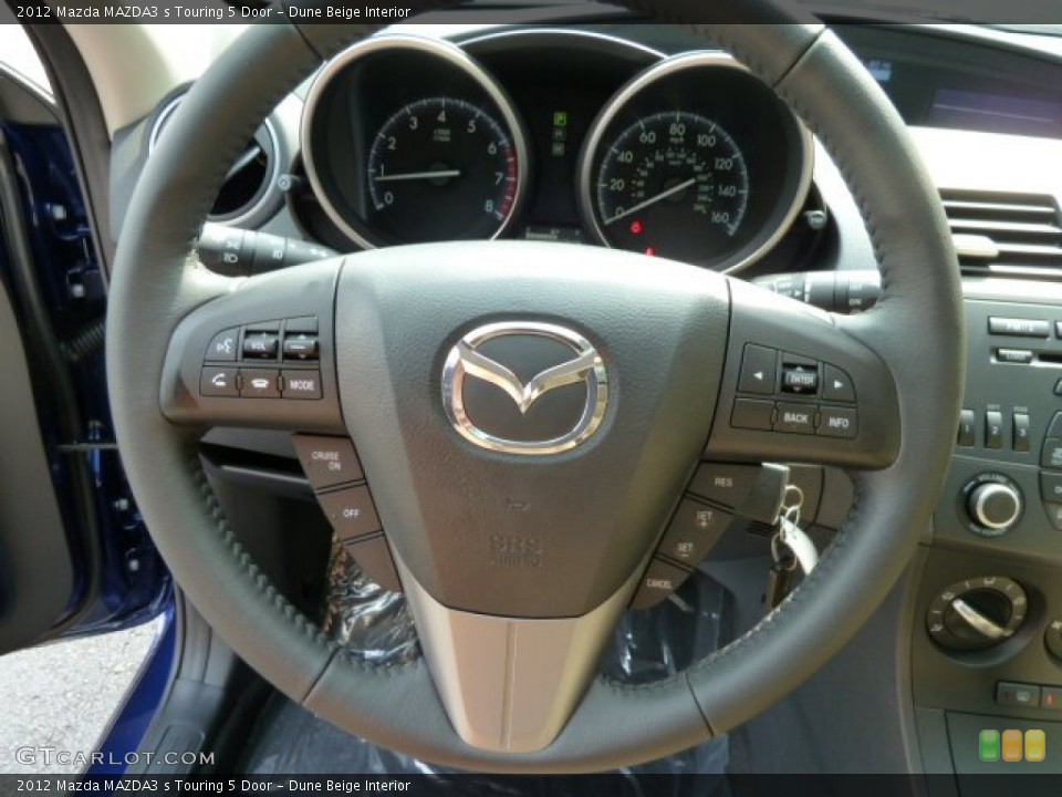Dune Beige Interior Steering Wheel for the 2012 Mazda MAZDA3 s Touring 5 Door #54462873