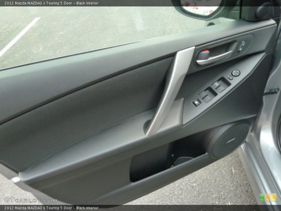 Black Interior Door Panel for the 2012 Mazda MAZDA3 s Touring 5 Door #54463026
