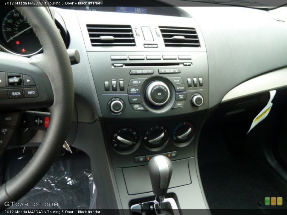 Black Interior Controls for the 2012 Mazda MAZDA3 s Touring 5 Door #54463059
