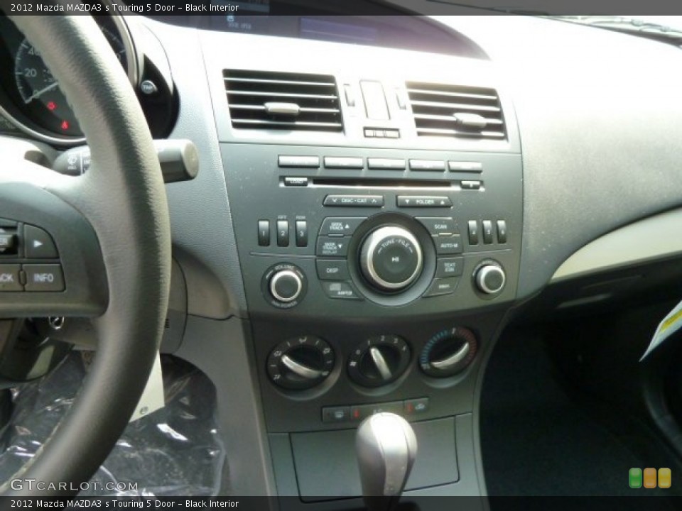 Black Interior Controls for the 2012 Mazda MAZDA3 s Touring 5 Door #54463194