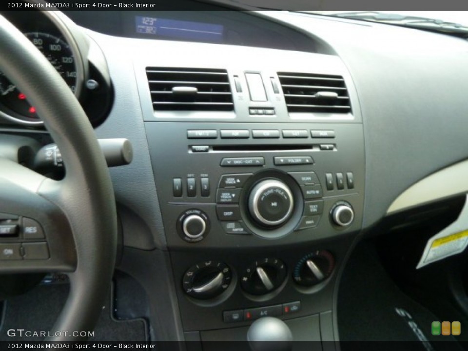 Black Interior Controls for the 2012 Mazda MAZDA3 i Sport 4 Door #54463746