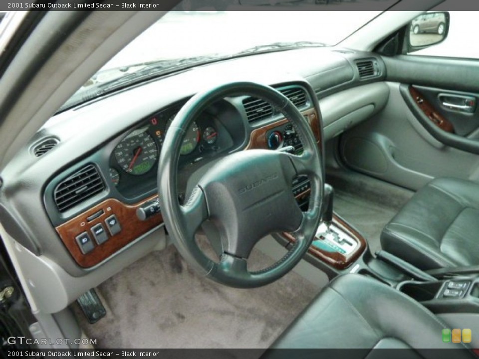 Black Interior Prime Interior for the 2001 Subaru Outback Limited Sedan #54480035