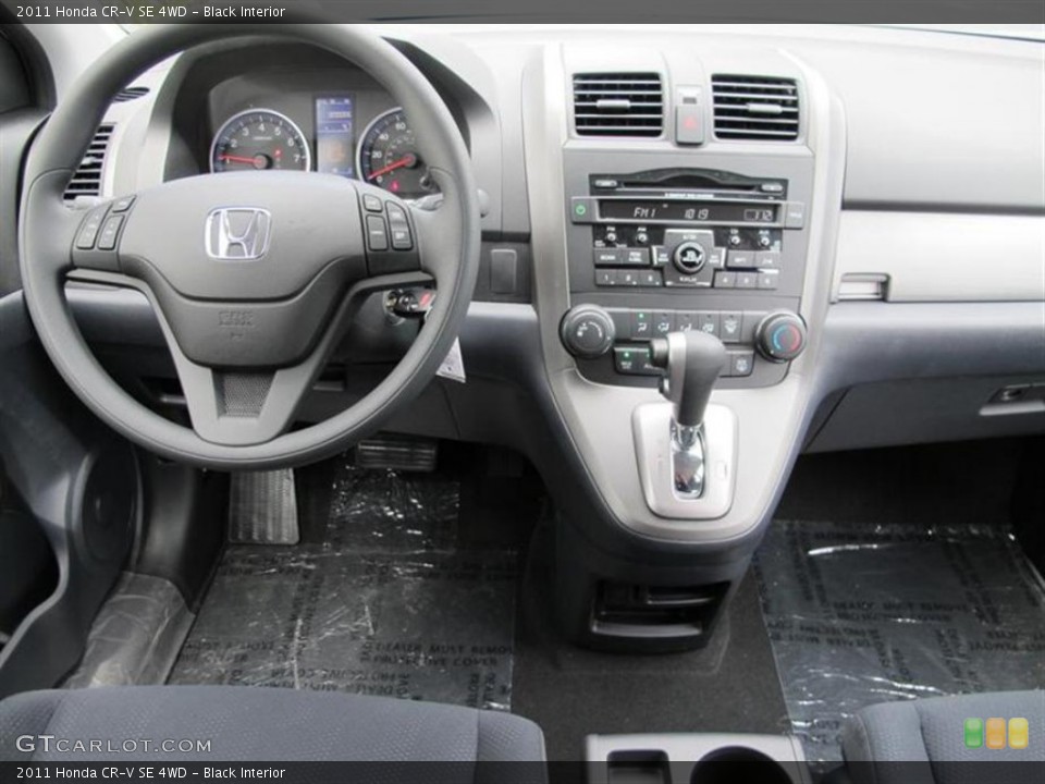 Black Interior Dashboard for the 2011 Honda CR-V SE 4WD #54480578
