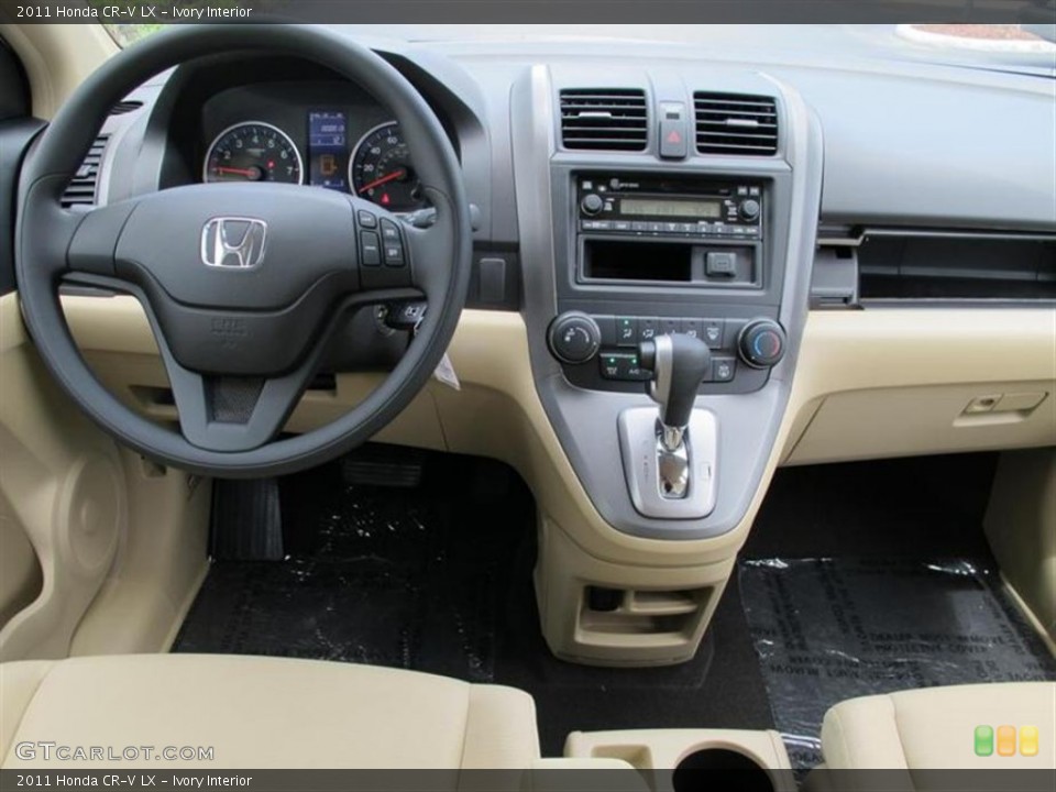 Ivory Interior Dashboard for the 2011 Honda CR-V LX #54480851