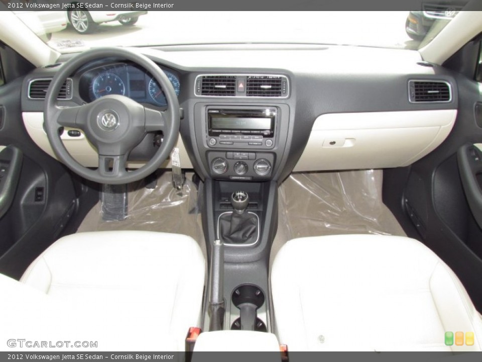 Cornsilk Beige Interior Dashboard for the 2012 Volkswagen Jetta SE Sedan #54488627