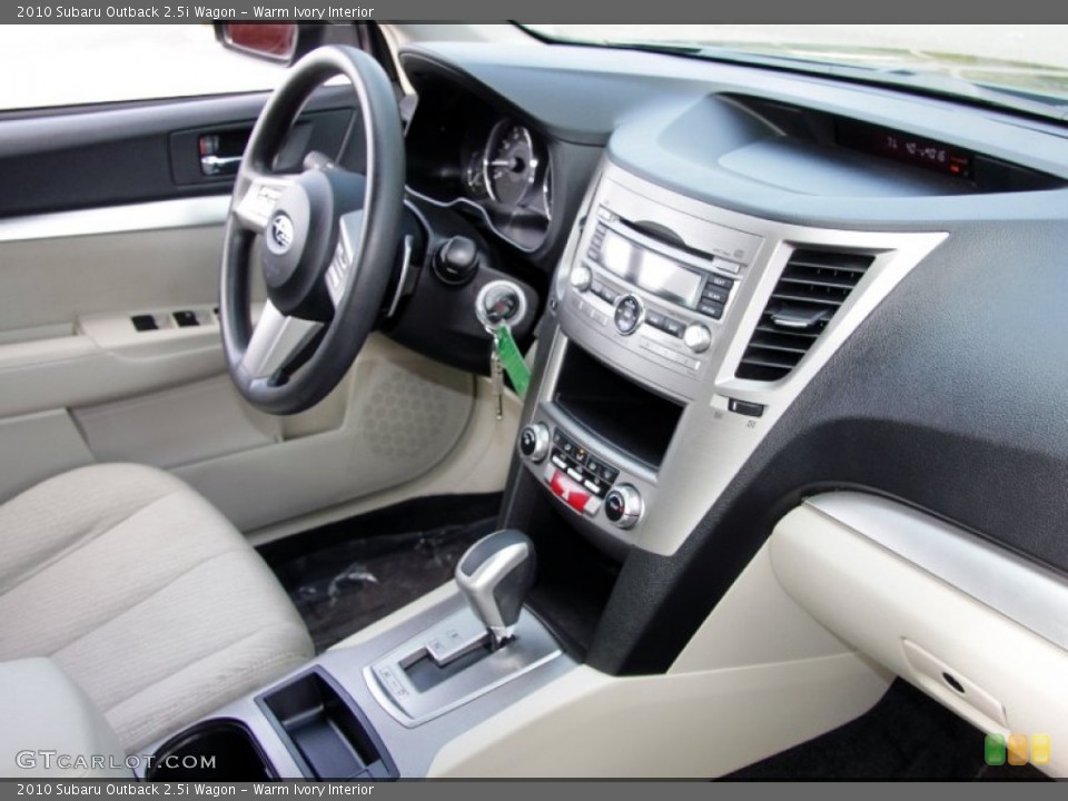 Warm Ivory Interior Dashboard for the 2010 Subaru Outback 2.5i Wagon #54497021