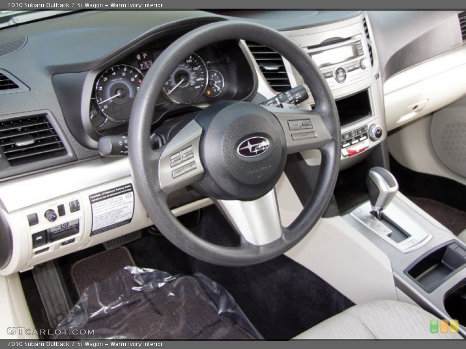 Warm Ivory Interior Dashboard for the 2010 Subaru Outback 2.5i Wagon #54497099