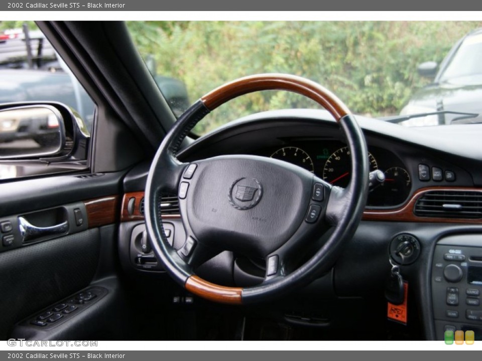 Black Interior Steering Wheel for the 2002 Cadillac Seville STS #54509804